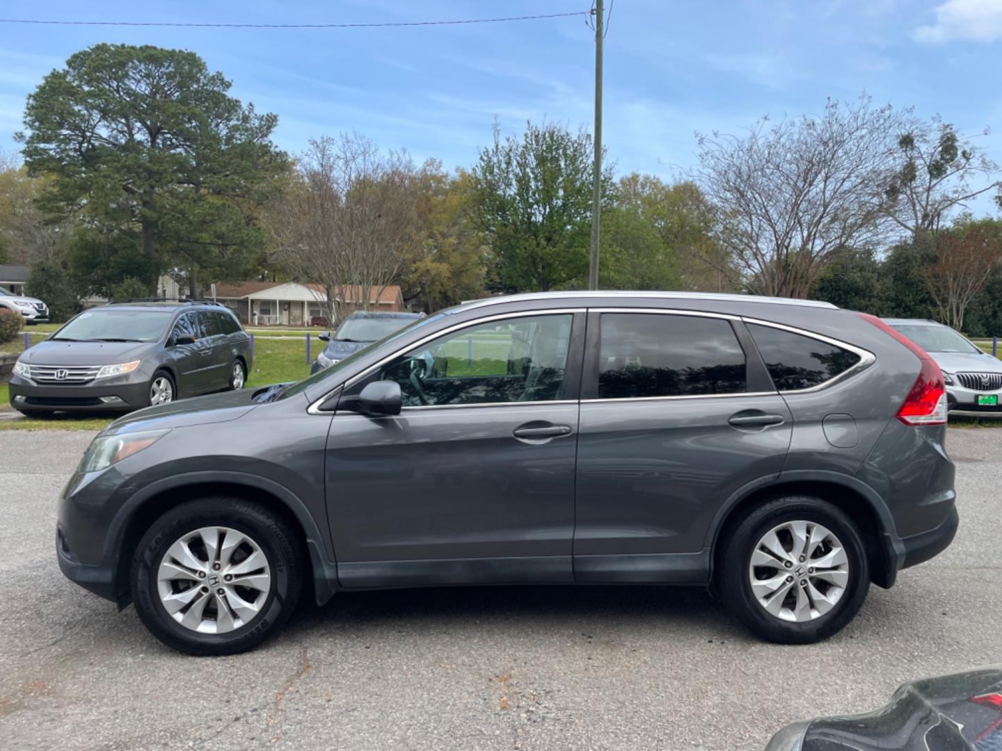 2014 GRAY HONDA CR-V EX-L (2HKRM3H73EH) with an 2.4L engine, Automatic transmission, located at 5103 Dorchester Rd., Charleston, SC, 29418-5607, (843) 767-1122, 36.245171, -115.228050 - Clean interior with Leather, Sunroof, Backup Camera, 6-Disc CD/AUX/Sat, Hands-free Phone, Dual Climate Control, Power Everything (windows, locks, seats, mirrors), Heated Seats, Keyless Entry, Alloy Wheels. Local Trade-in!! 188k miles Located at New Life Auto Sales! 2023 WINNER for Post & Courier's - Photo#3